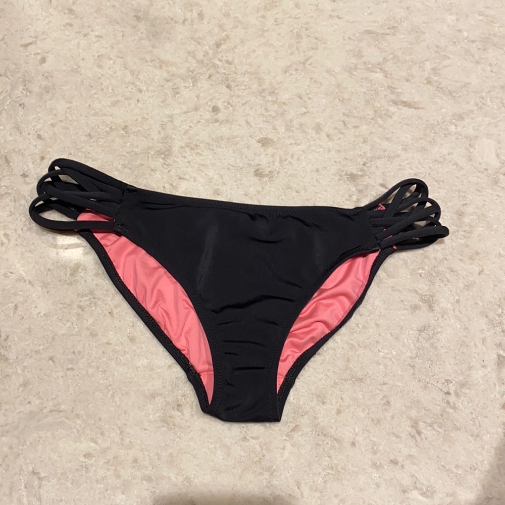 Pink Victoria’s Secret bathing suit bottoms
